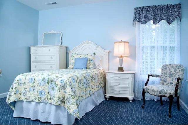 Bedroom equipped with essential safety features for seniors at Chesapeake Manor, known as one of the best assisted living homes in Maryland, offers comfort and security.