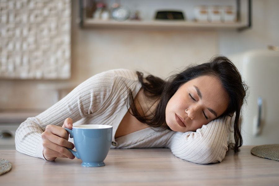 Signs it's time to consider respite care for a family caregiver experiencing exhaustion and feeling overwhelmed.